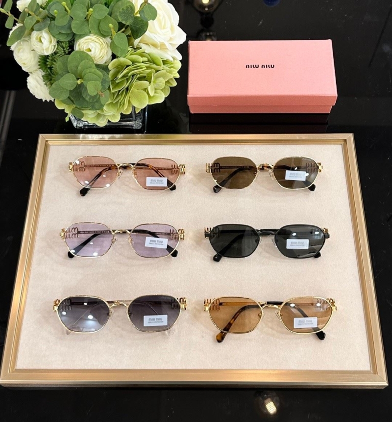 Miu miu Sunglasses